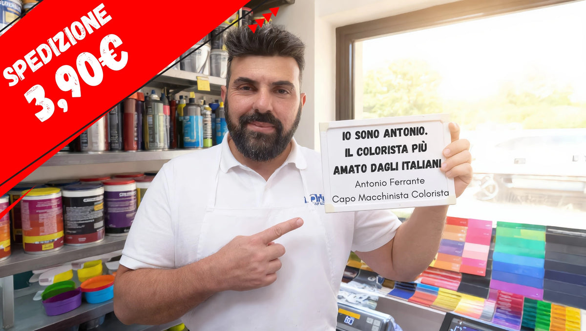 Antonio Ferrante, capo macchinista colorista di Colori&Vernici, davanti agli scaffali delle vernici